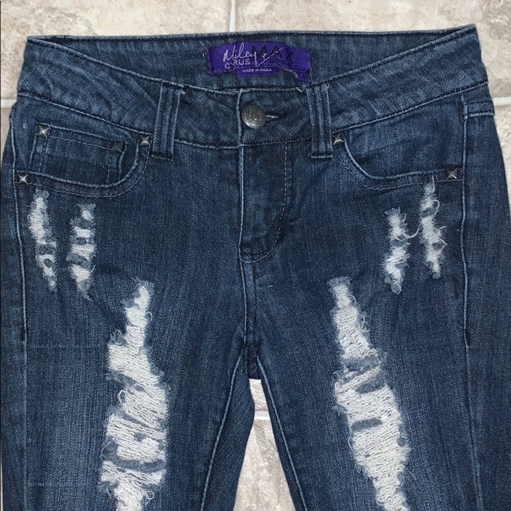 Miley Cyrus & Max Azria Rip Jeans